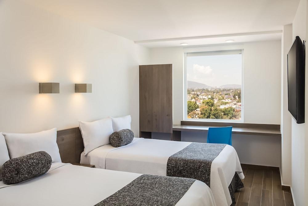 Sleep Inn Leon Antares Bagian luar foto