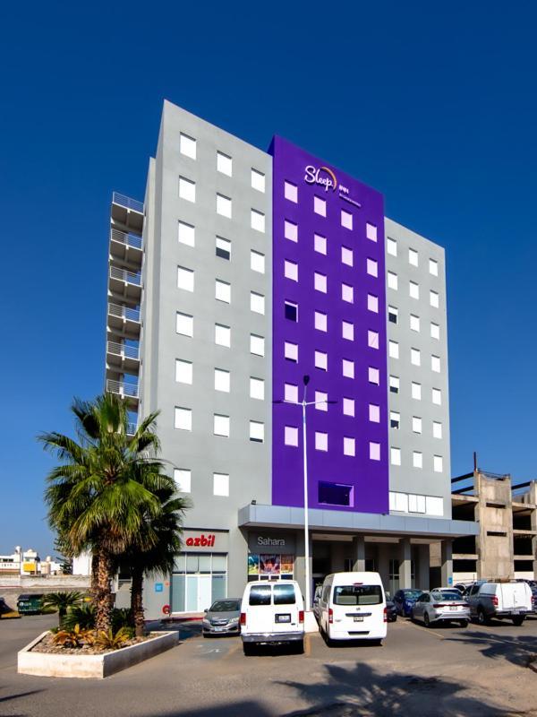 Sleep Inn Leon Antares Bagian luar foto