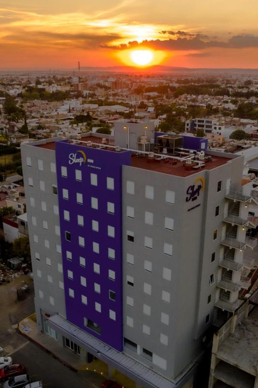 Sleep Inn Leon Antares Bagian luar foto