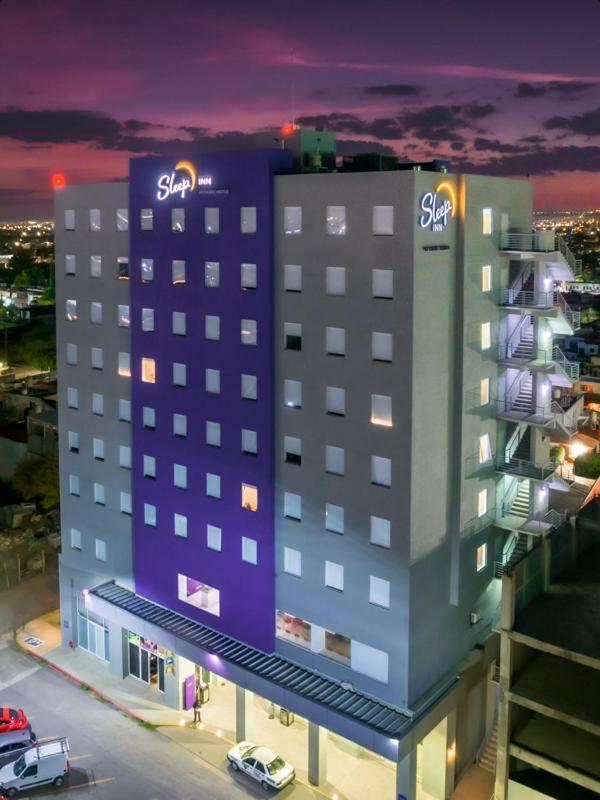 Sleep Inn Leon Antares Bagian luar foto