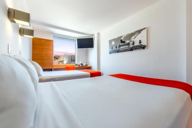 Sleep Inn Leon Antares Bagian luar foto