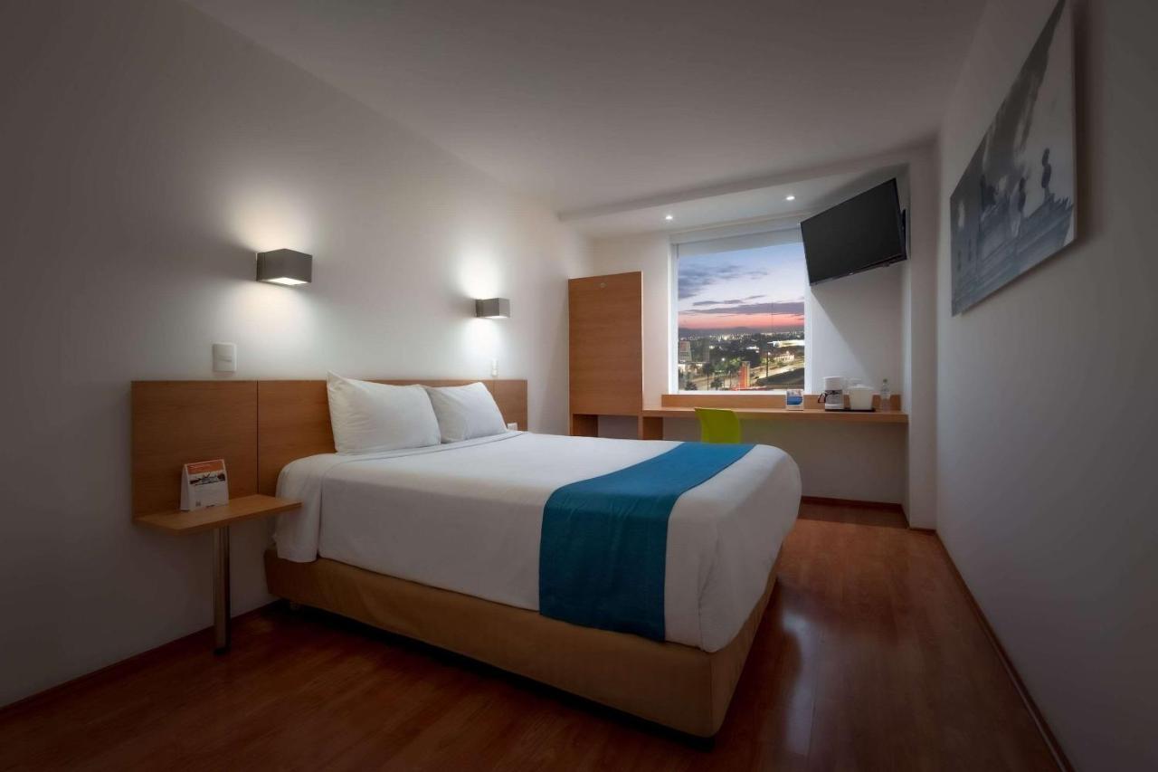 Sleep Inn Leon Antares Bagian luar foto