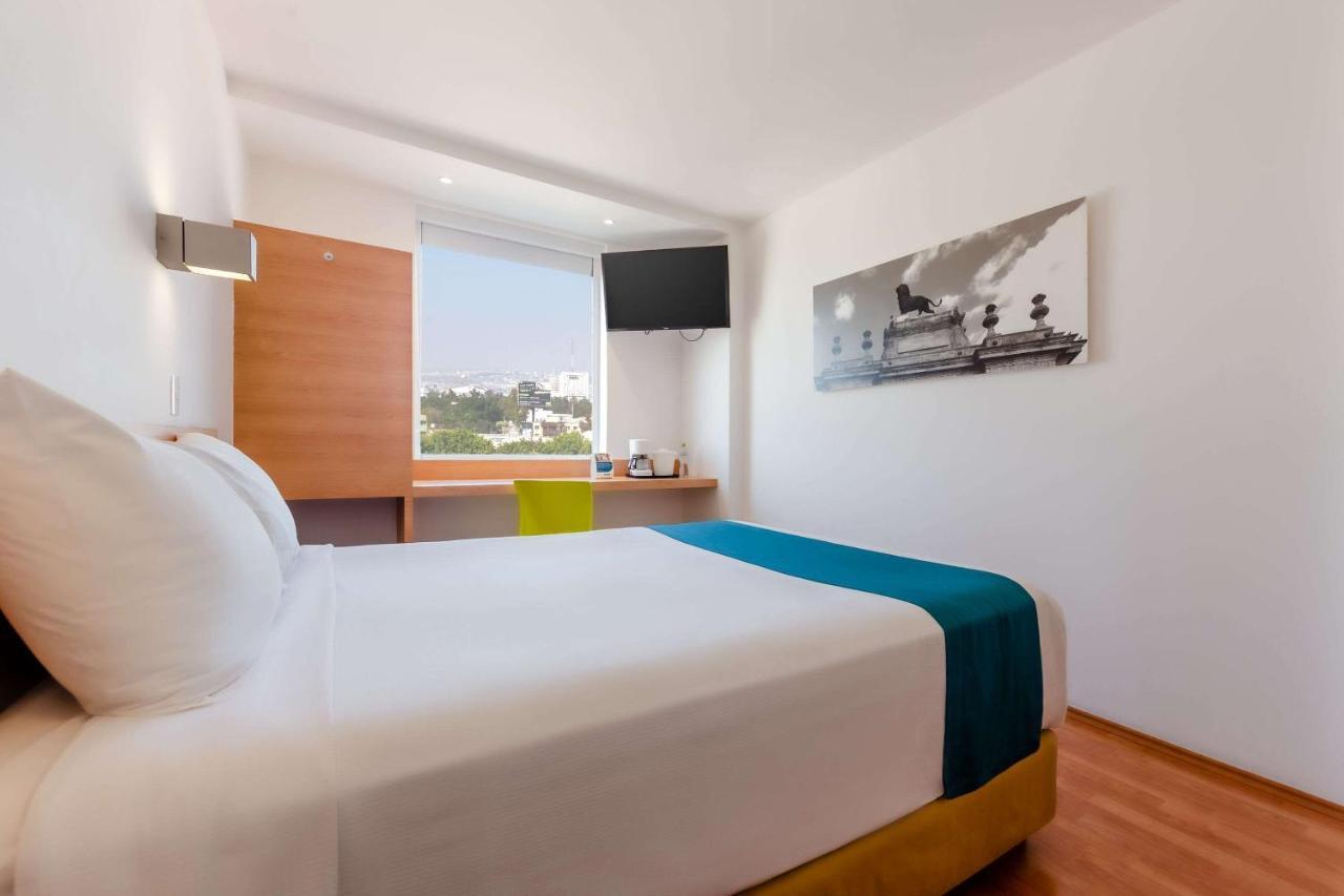 Sleep Inn Leon Antares Bagian luar foto
