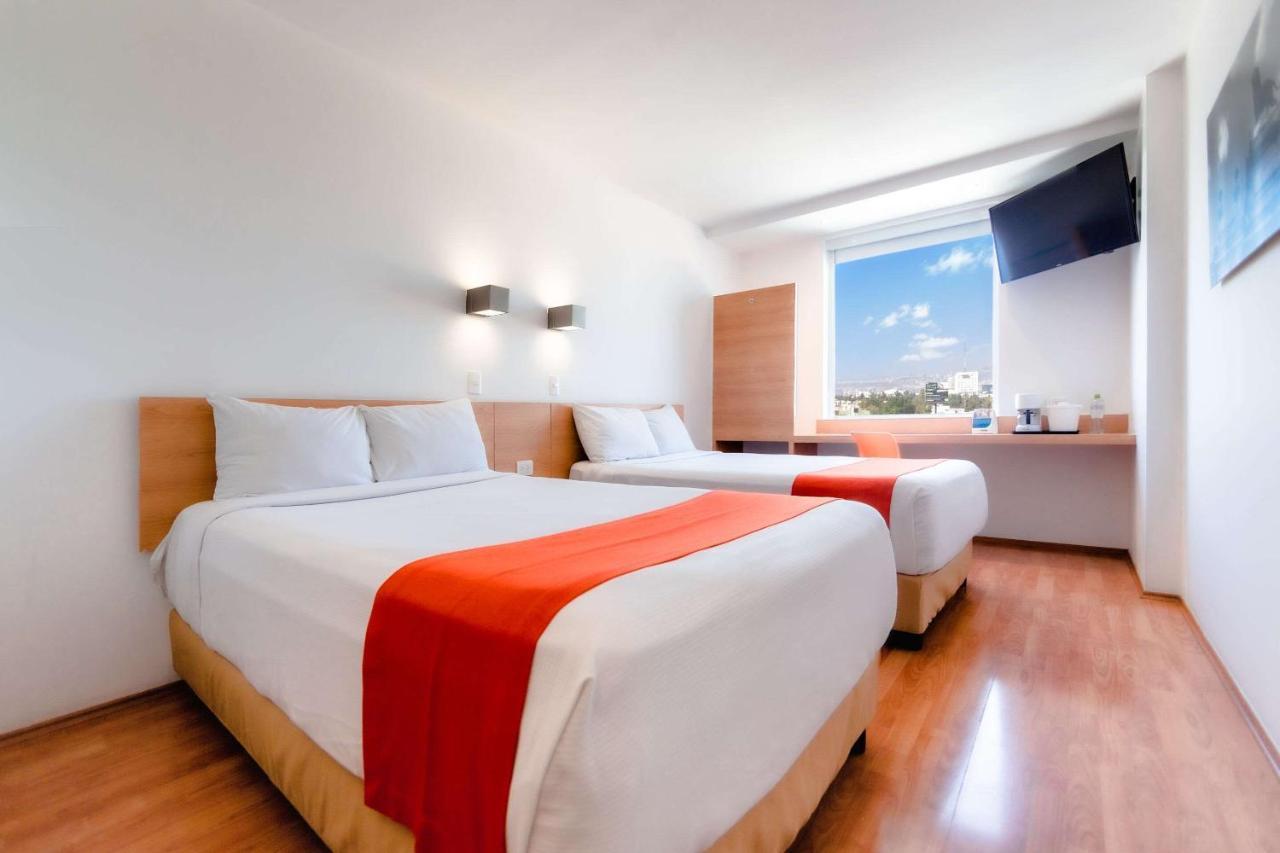 Sleep Inn Leon Antares Bagian luar foto