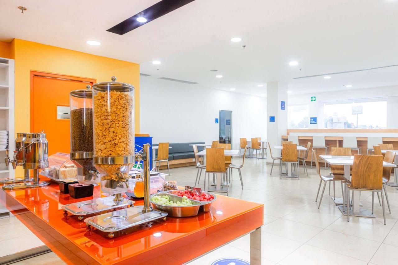 Sleep Inn Leon Antares Bagian luar foto