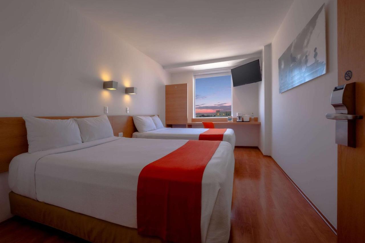 Sleep Inn Leon Antares Bagian luar foto