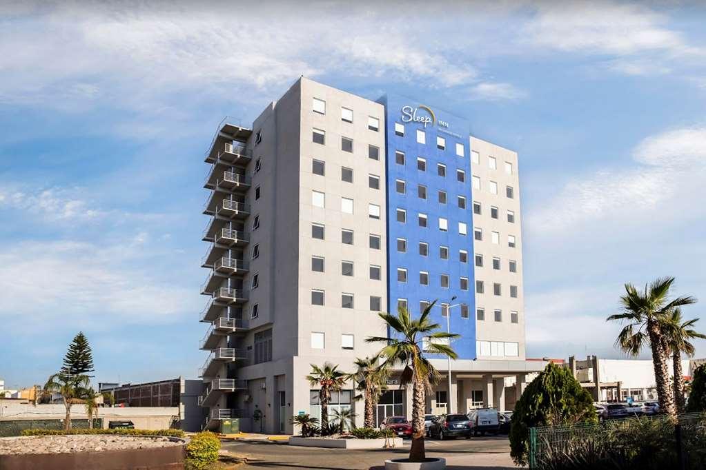 Sleep Inn Leon Antares Bagian luar foto
