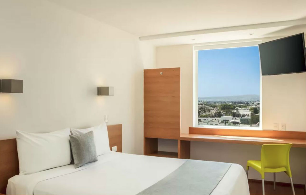 Sleep Inn Leon Antares Bagian luar foto